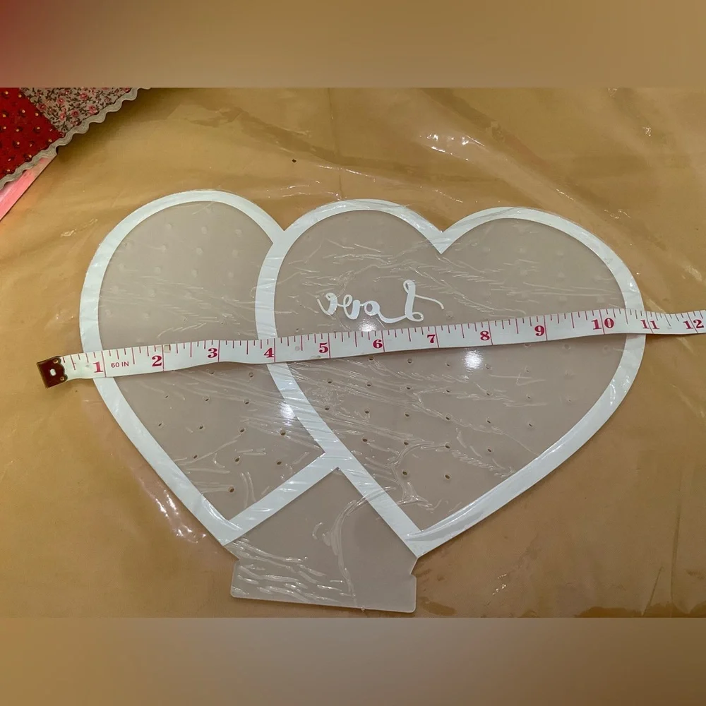 Hutuzldz: Double heart shaped design white acrylic earrings holder/organizer.